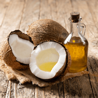 Photo of coconuts and coconut oil used in some massages